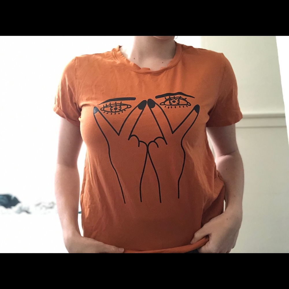 Orange T-shirt with artsy print